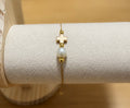 Cross & pearl bracelet